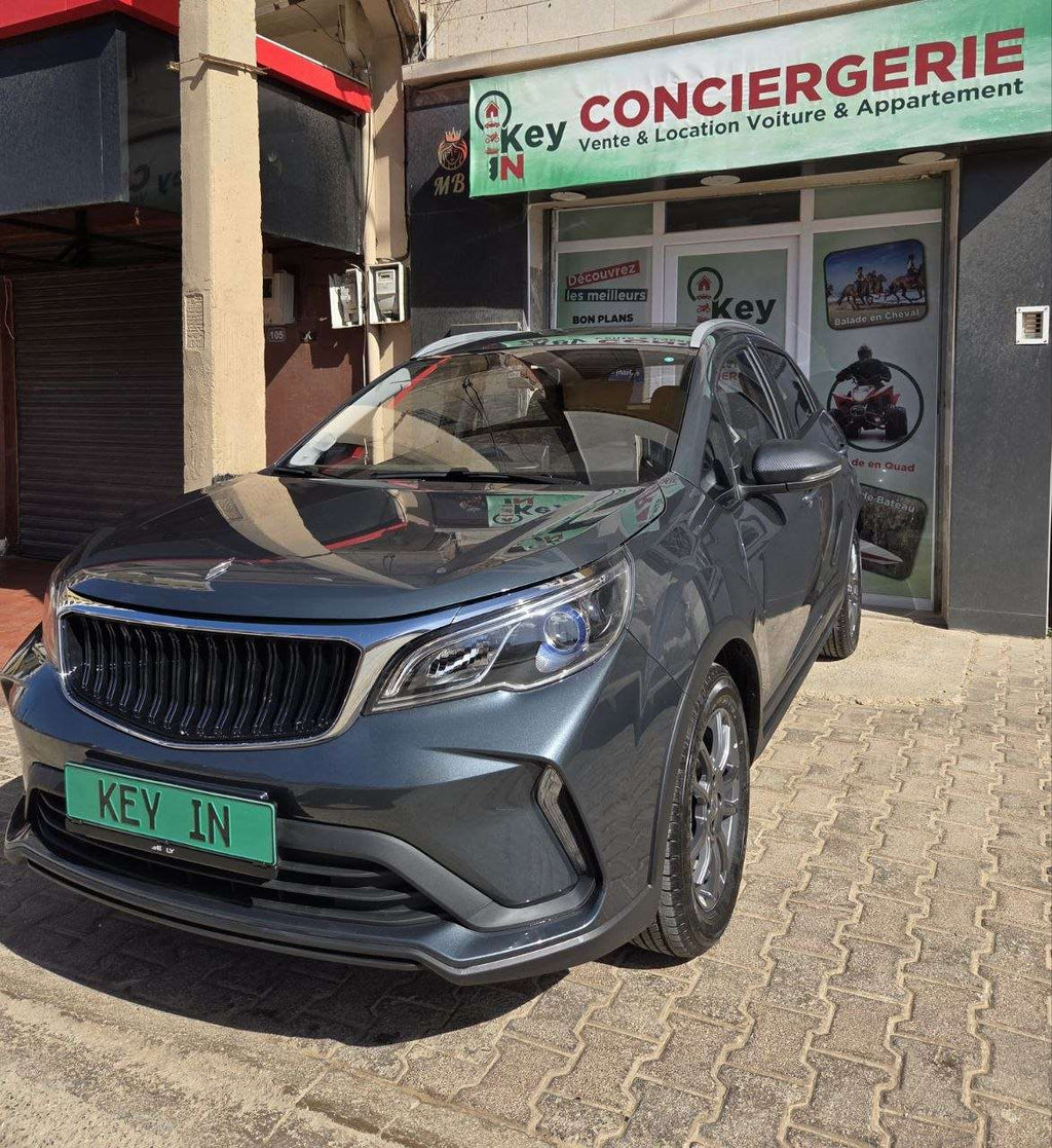 Location voiture Oran Geely Livan X3 SUV automatique climatisé aéroport Ahmed Ben Bella livraison Algérie Keyin-DZ conciergerie location véhicule famille diaspora